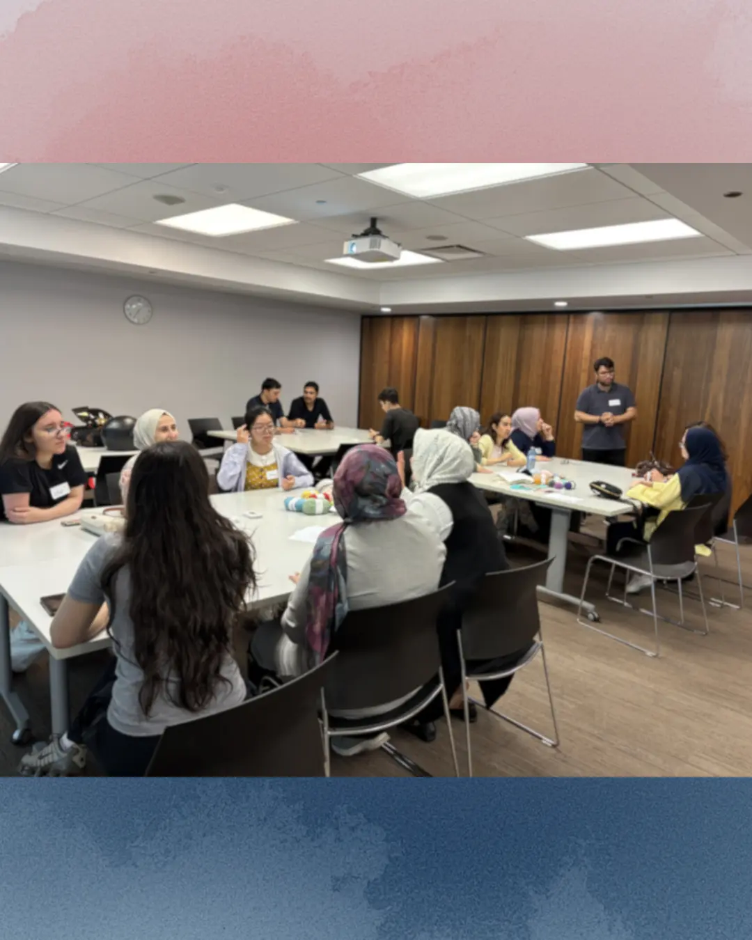 Participants creating punch knitting art pieces at the Threads of Peace workshop at Kitchener Public Library as part of United in Voices preparations.