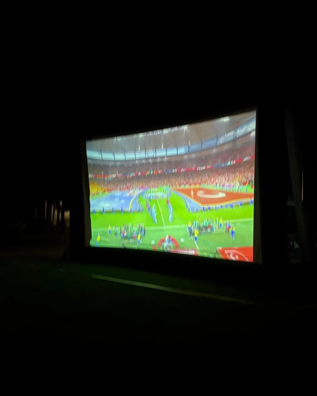 Türkiye vs Australia Match Night at GRFS Community members gathered outdoors at GRFS to watch the Türkiye vs Australia World Cup match on a big screen, celebrating football, friendship, and community connection.