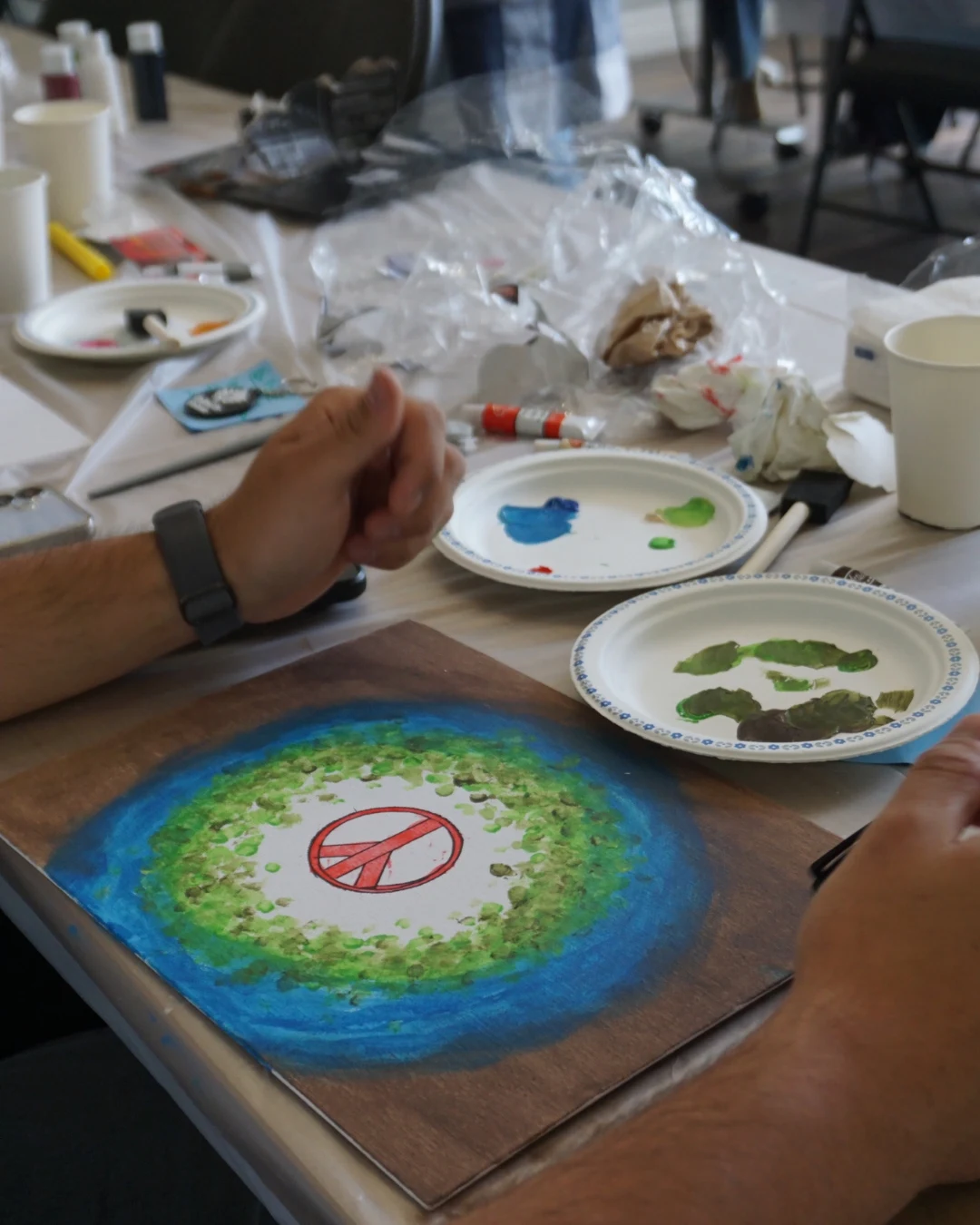 Youth participants at a GRFS art workshop sharing ideas about environment, poverty, education, bullying, health, and positive community change.
