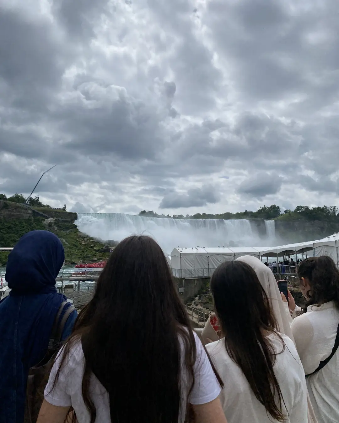 GRFS Grade 9 students participating in an educational Niagara Falls trip with a boat cruise, park visits, and group activities.