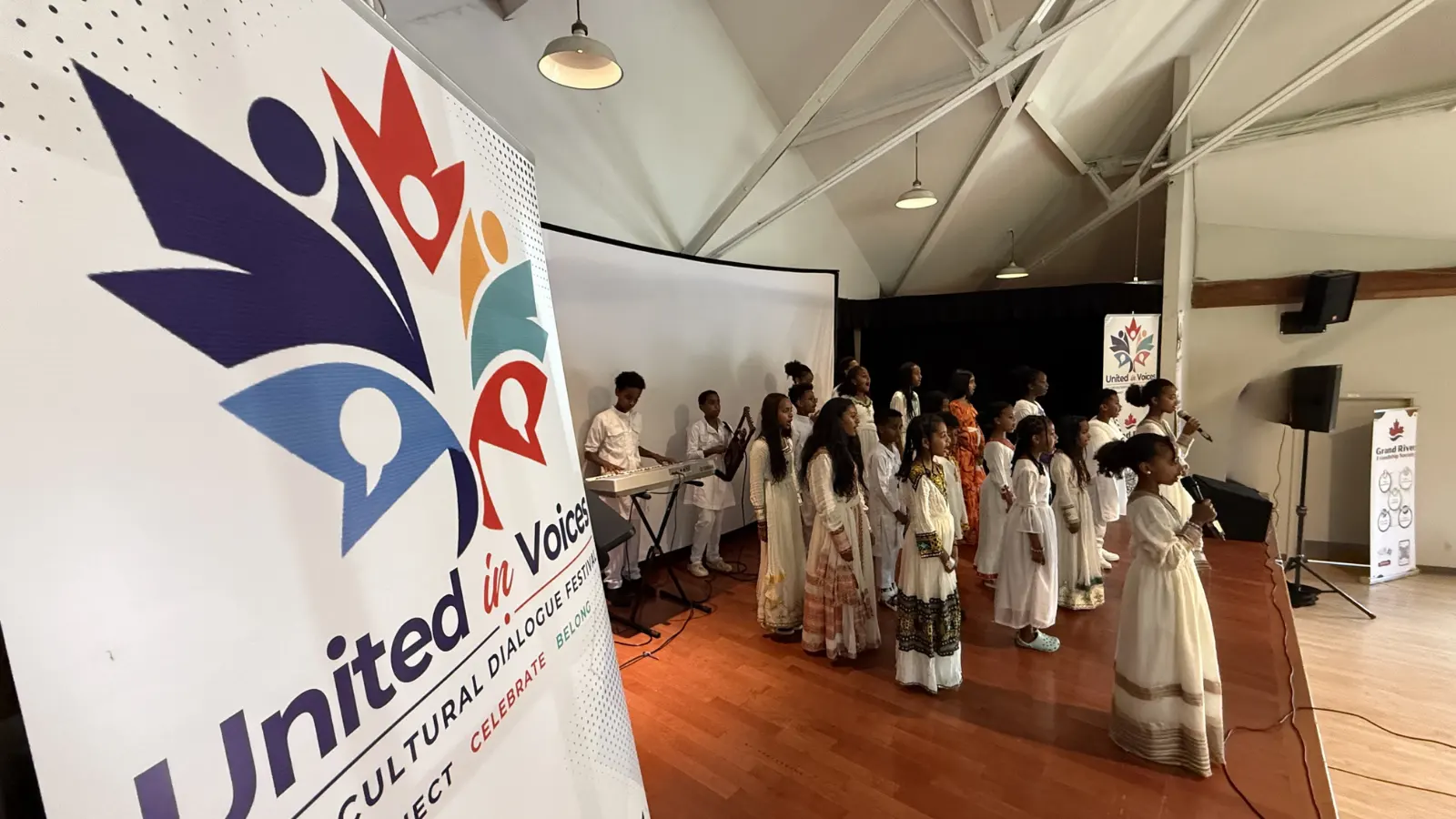 United in Voices Intercultural Dialogue Festival participants, performers, community booths, and cultural activities at Victoria Park hosted by Grand River Friendship Society.