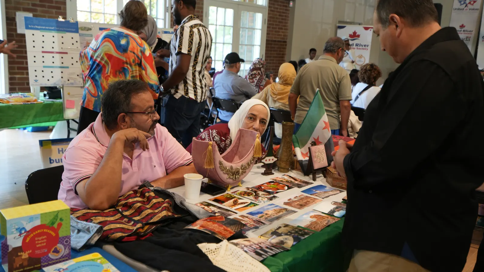 United in Voices Intercultural Dialogue Festival participants, performers, community booths, and cultural activities at Victoria Park hosted by Grand River Friendship Society.
