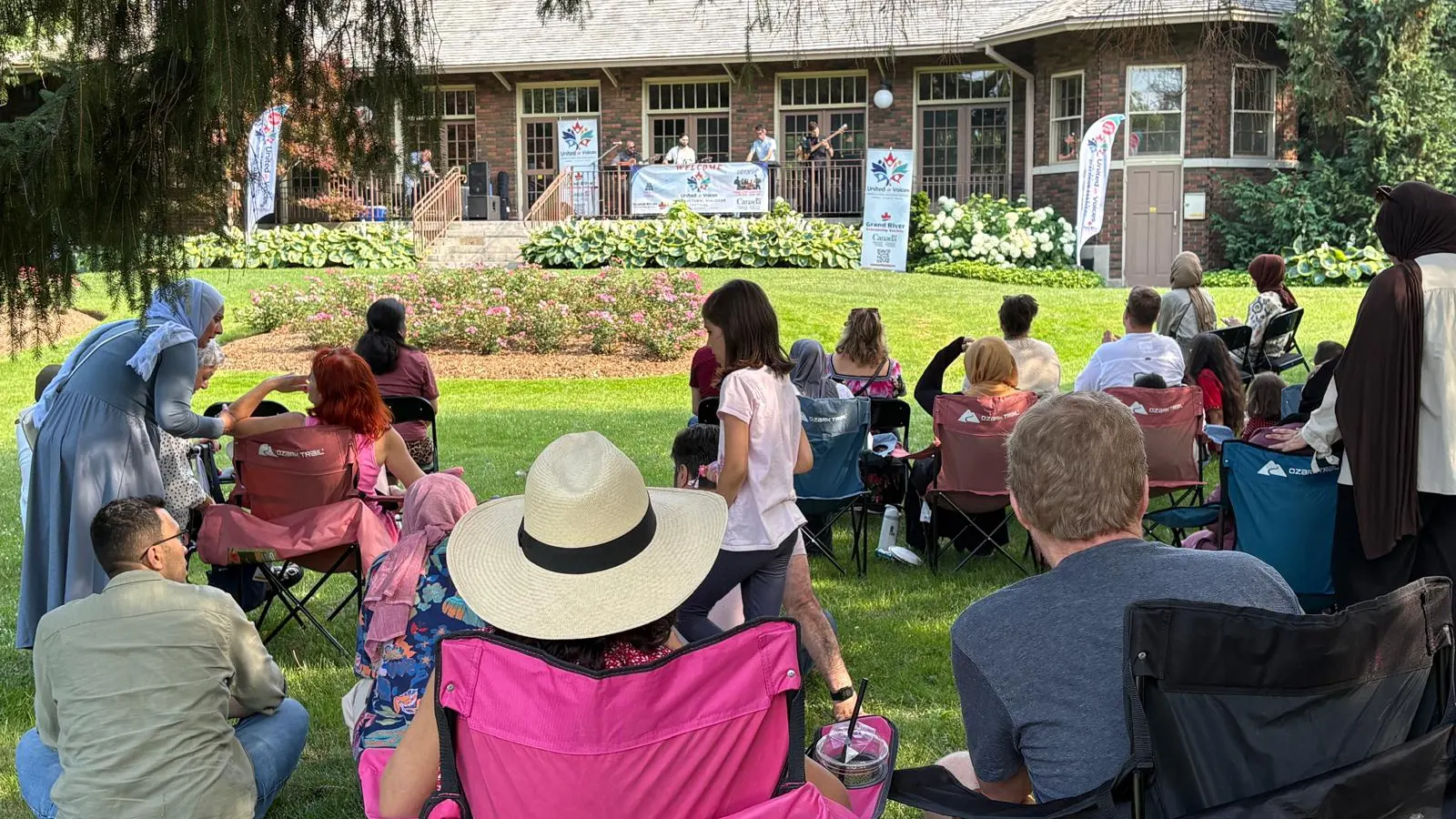 United in Voices Intercultural Dialogue Festival participants, performers, community booths, and cultural activities at Victoria Park hosted by Grand River Friendship Society.