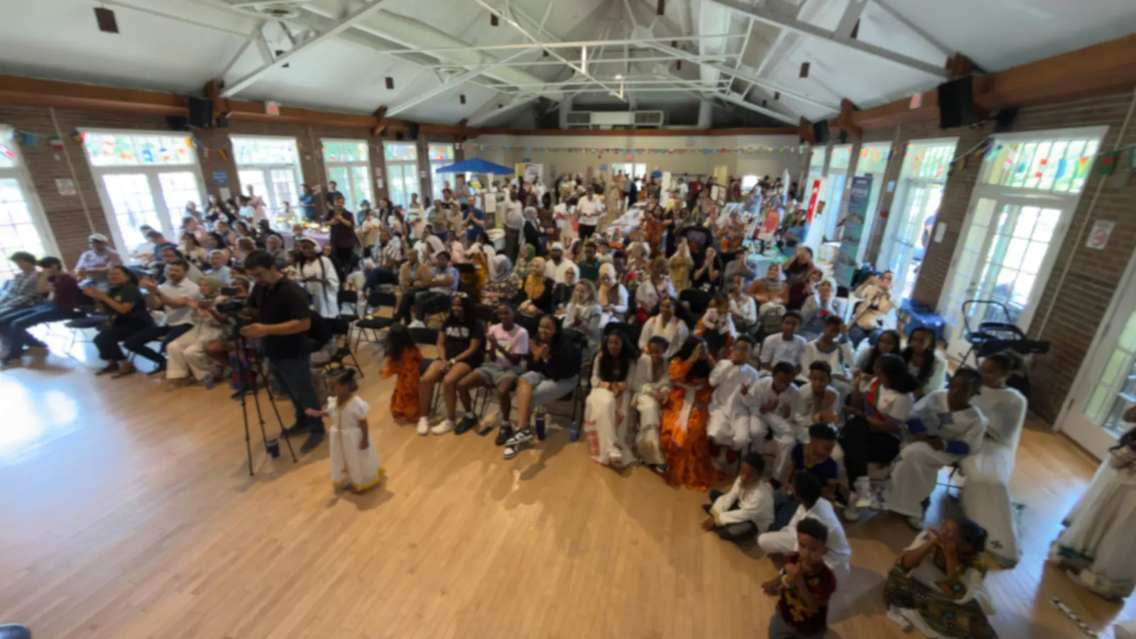 United in Voices Intercultural Dialogue Festival participants, performers, community booths, and cultural activities at Victoria Park hosted by Grand River Friendship Society.