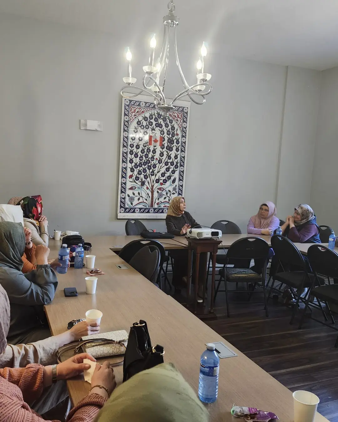 Families attending the GRFS Family Conversations #2 program in the GRFS garden, focused on communication, relationships, and stronger family connections.
