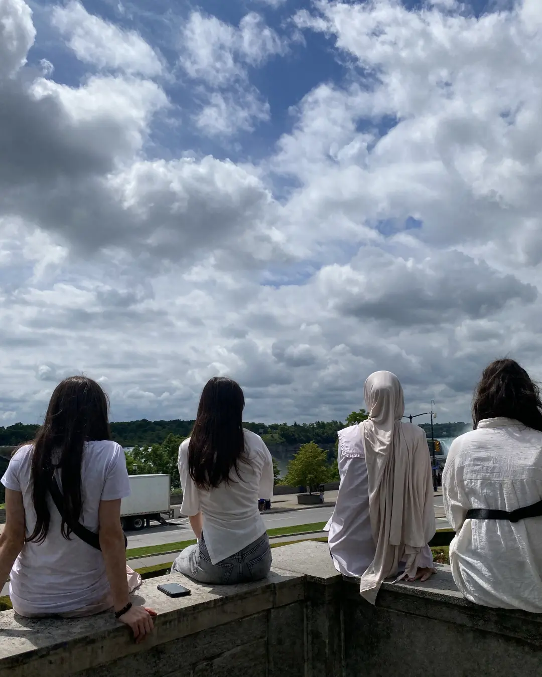 GRFS Grade 9 students participating in an educational Niagara Falls trip with a boat cruise, park visits, and group activities.