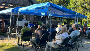Families attending the GRFS Family Conversations #2 program in the GRFS garden, focused on communication, relationships, and stronger family connections.