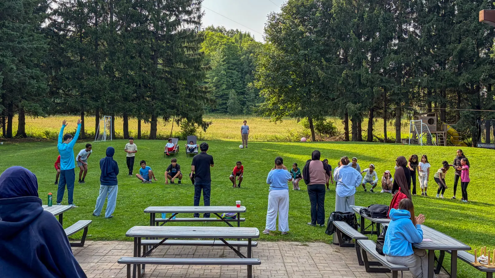 Children participating in outdoor team-building and sports activities during GRFS Kids To Camp 2026.