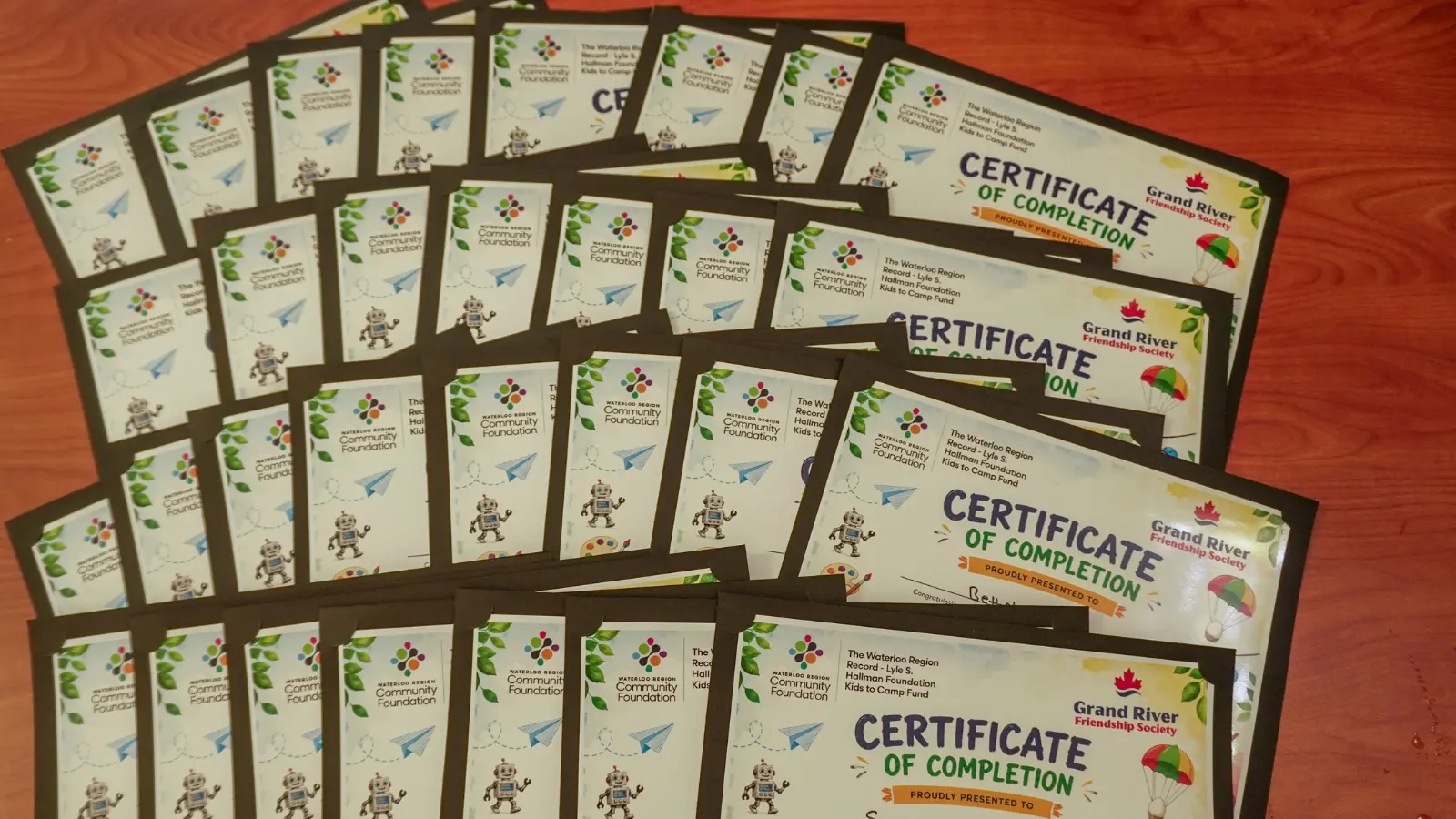 Kids To Camp 2026 certificates recognizing participant completion and program funding support.
