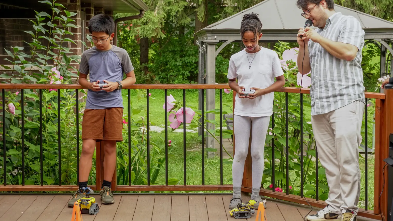 Children demonstrating small robots during a hands-on Robotix STEM activity at Kids To Camp 2026.
