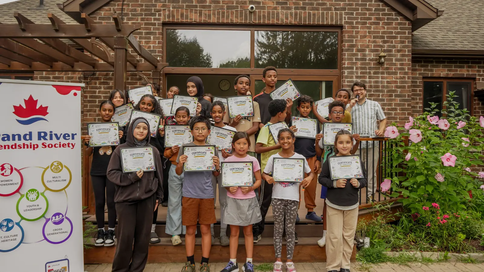 GRFS Kids To Camp 2026 participants holding certificates of completion at the closing celebration.