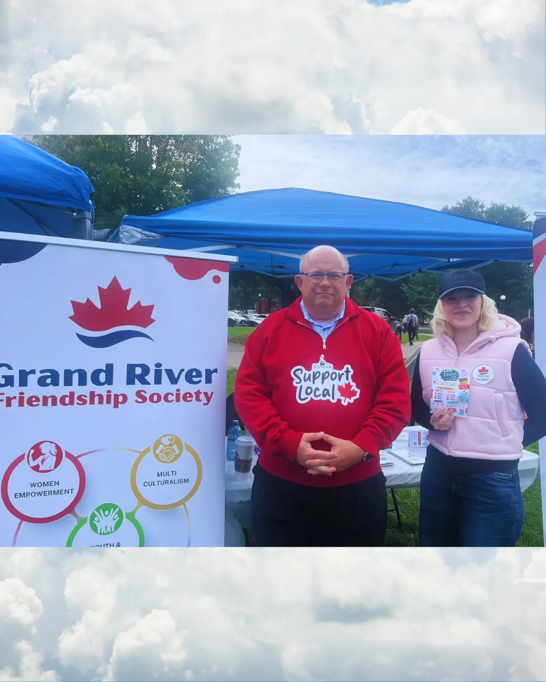 Visitor and GRFS volunteer at the information table during the 2026 Kitchener Terry Fox Run