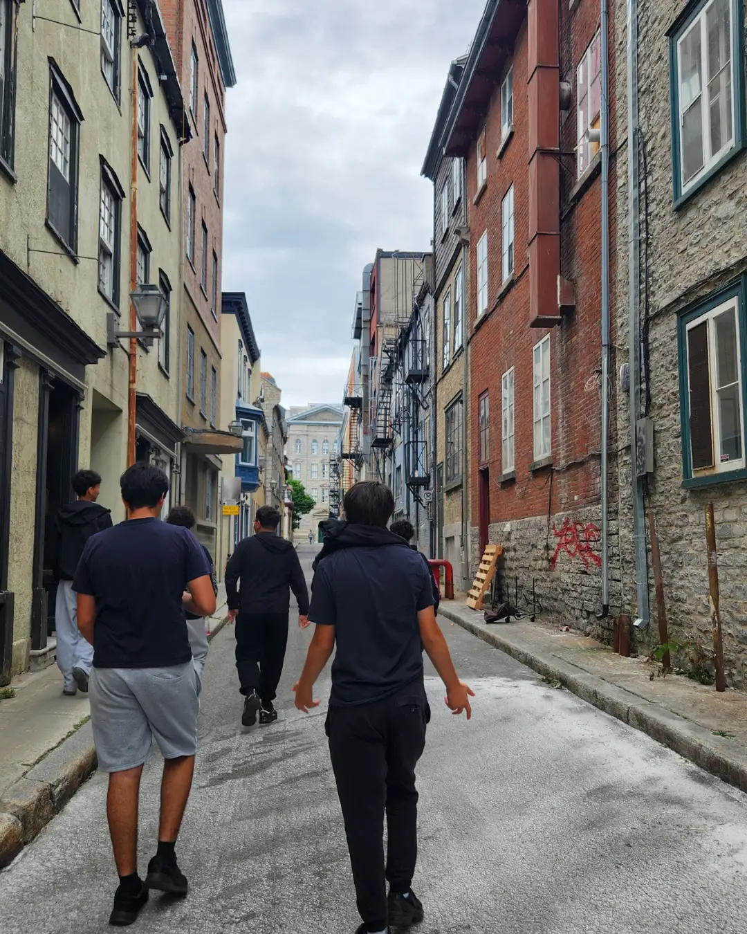 GRFS Quebec Trip 2026 - 02 GRFS students exploring a historic street in Quebec City