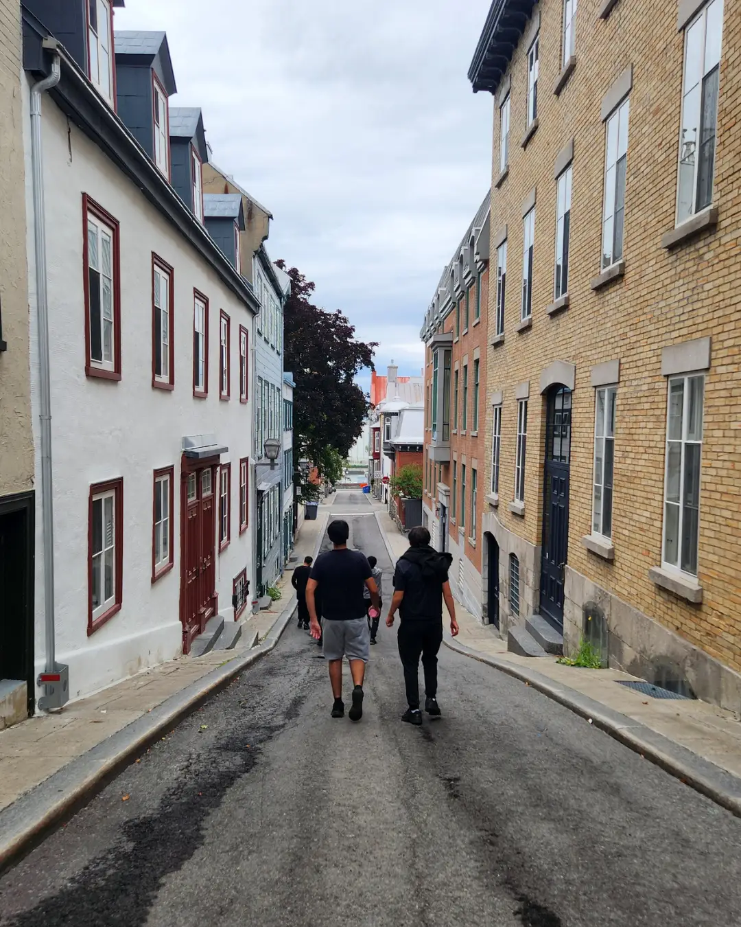 GRFS Quebec Trip 2026 - 08 GRFS students walking downhill through historic Quebec City