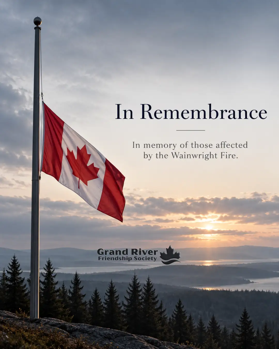 GRFS remembrance poster with a Canadian flag at half-mast above a sunset landscape, honouring those affected by the Wainwright Fire.