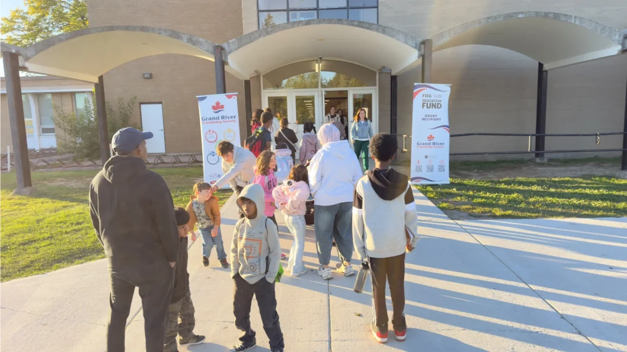 Families gathering outside the school entrance for the GRFS Fall 2026 education program.