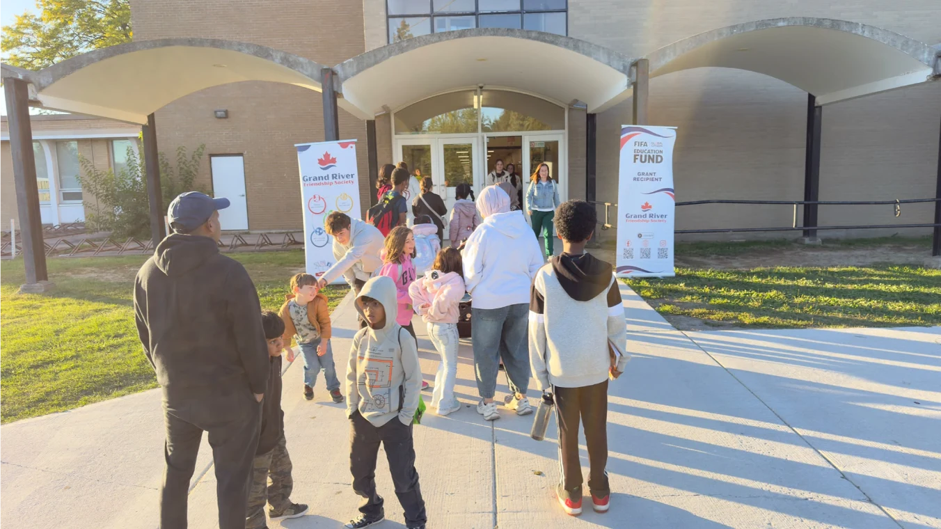 Families gathering outside the school entrance for the GRFS Fall 2026 education program.